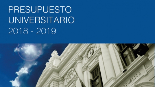 Imagen con el texto "Presupuesto universitario 2018 - 2019" y parte de la fachada del edificio central de la universidad 